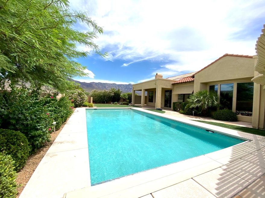 We are proud to offer an outstanding one of a kind Catalina Model modified & designed w/ 2 car side load garage & additional large 3rd car garage. Mountain Views & Crystal Blue Pool. This could be your own private resort style property located in ''The Preserve'' section of SaddleBrooke. 3 bedrooms, 3.5 baths & 2 additional rooms for you to use as den, office or quiet times. Enter inviting courtyard to view double glass french doors to spacious guest house. Custom Iron security doors leading to wide open spacious entry foyer you are greeted by floor to ceiling bay windows & views of sparkling Olympic size solar heated pool. Ceramic tile floors everywhere, chef's delight kitchen with New built-in refrigerator, gas cook top, slab granite counters & walk-in pantry.  Come visit, plan to stay.