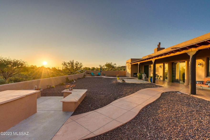 Views, views, views!  This stunning custom built 4 bedroom home in the Tucson Mountains offers unparalleled views, peace and privacy. Watch the fireworks from your backyard without leaving home.  Close to Camino De Cerro trailhead in Saguaro National Park, West.  Sunrise views from the back courtyard, sunset views from the front courtyard.  This home is a gem, this location is the heart and soul of the desert living.
