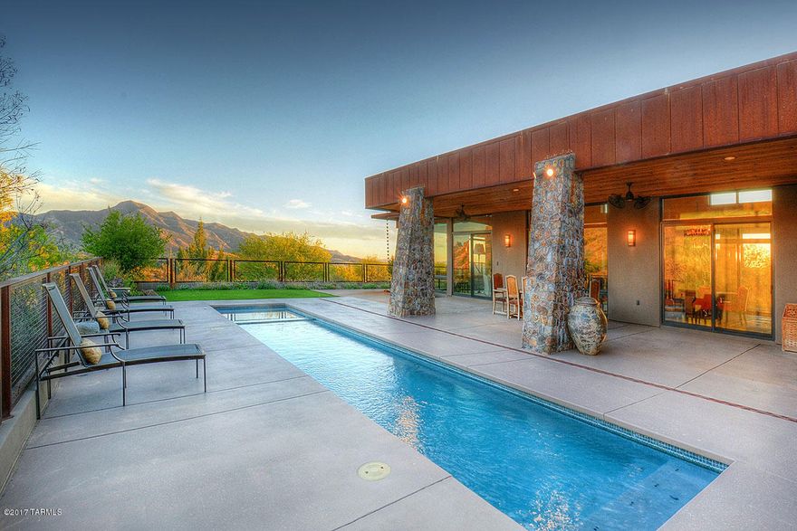 REDUCED PRICE ON 40.87ACRES - Rail X Ranch Estates - a well established gated community located in SE AZ's wine & ranch country rich in the history of the great American West. Approx. 1 hr from Tucson/Tucson Int'l airport, this exquisite country estate is of contemporary design with a blend of old world charm, highly appointed throughout w/majestic windows capturing views from every room of surrounding mountain ranges. Entertain in the gourmet kitchen and formal DR or outdoors by the evening glow of the lap pool with a backdrop of wondrous sunsets. You can hike or ride your horses to the nearby Nat'l forest and treat family & friends to the 2BR/1BA guest wing, the theater style media room, porches, & courtyardS. ADJACENT 41.5 ACRES (PARCEL 110-60-014) MAY BE PURCHASED AT ADD'L PRICE.