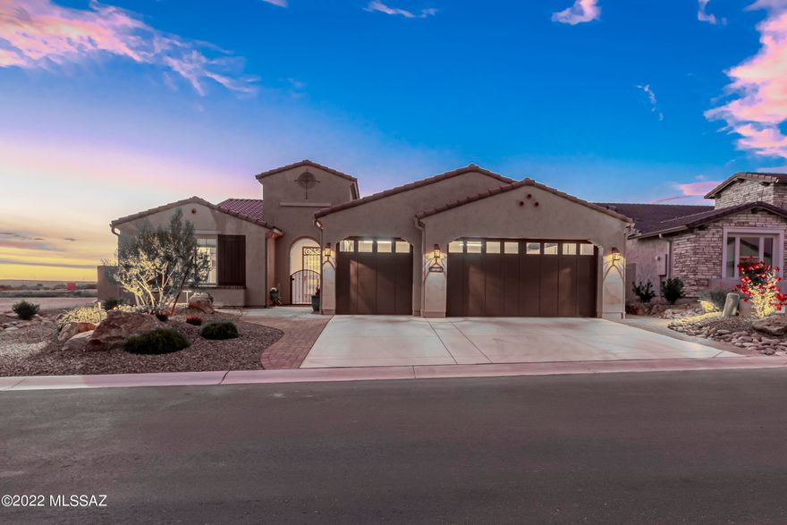 Superior design and exquisite finishes are featured in this Modern Style, entertainers dream home. This magnificent Vienta floor plan in Saddlebrooke Ranch is loaded with upgrades. The open floor plan features many special touches including upgraded cabinets, ceramic tile flooring, Quartzite counter tops, designer backsplash, upgraded light fixtures, ceiling fans and so much more. Cooking is a chef's delight in this bright, open, gourmet kitchen featuring generous center island, upgraded stainless steel appliances and plenty of storage including a large walk-in pantry. Expanded Owners suite offers a luxurious oversized, walk-in shower and a spacious walk -in closet with upgraded built-ins for additional storage. The pool and water feature offer private outdoor living at its very best. Complete with water feature