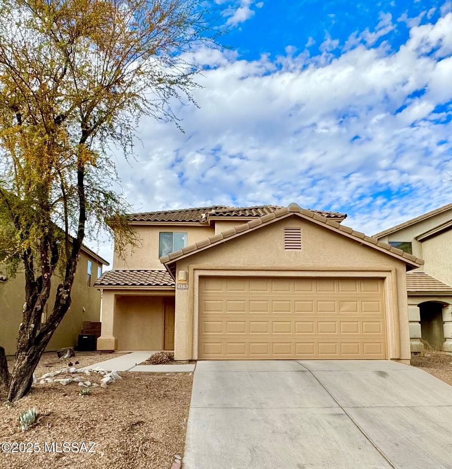 Turnkey home in perfect location! Tons of shopping, employers, any amenity and I-10 and DMAFB close by. Two large living areas, vast storage and obvious pride of ownership throughout. First floor primary suite is both expansive and inviting with light filled windows and a large walk-in closet replete with custom shelving! Open concept living with 20x20 tile and great sight lines. Second huge living area upstairs with 3 spacious bedrooms and laundry. Two of the guest rooms even have walk in closets! Spacious backyard with pavers, mature landscaping and room for everyone. Neighborhood park with huge green space and walking trail just a 2 minute walk away. Fresh exterior paint, spotless inside and out. All it needs is you - welcome home! OFFERED BY OWNER/AGENT licensed in the state of AZ.