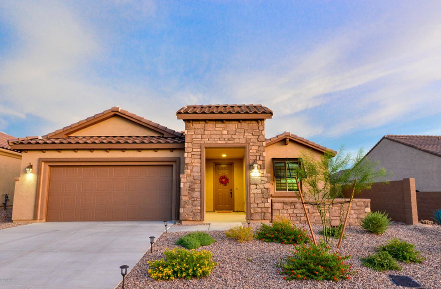 Welcome to Del Webb at Dove Mountain... One of Tucson's newest active adult communities!  This impeccably maintained home looks and feels brand new!  This Sanctuary Floorplan includes 2 Bed/2 Bath plus a den and a large great room that is perfect for entertaining.  Enjoy a Gourmet Kitchen that includes cherry cabinets, gas cook top, granite counter tops and backsplash, stainless steel appliances, soft close cabinets and walk in pantry.  Plantation shutters, water softener and so much more!   Community amenities include a state of the art fitness center, pool,spa, pickle ball, tennis, bocce and social activities!