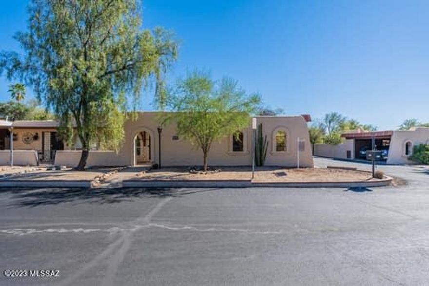 PRICE IMPROVEMENT: Great opportunity to live in this sought after Townhome Comm.of Pueblo Villas. Upon entering you notice the  mature manicured grounds with the addition of 2 Pools,Spa & Clubhouse...Perfect! .This delightful home on a corner lot has 2 spacious Bedrooms,2 baths, light & bright Combo Greatroom/ Dining Area with a charming southwestern style Beehive fireplace which adds to the ambiance of the room. The backyard offers a low maintenance oasis for you to enjoy and create your very own space with additional plantings and flowering pots. Parking is convenient with attached covered parking space for easy access. 
Newer, HVAC 2019 ,water heater, Roof re-coated 2021 and  new carpeting in both Bedrooms. Close to shopping,Restaurants & recreation. Ready for you to call it HOME!