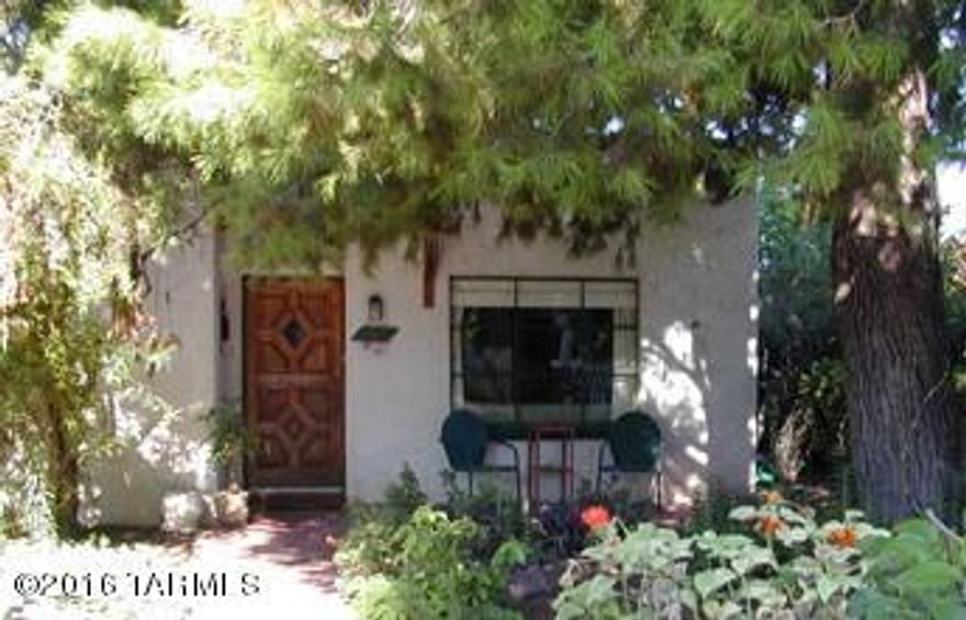 Fabulous 3BR, 2BA home privately situated in the Sam Hughes neighborhood. Additional detached 3-rm building adds 800 s.f. and 1/2 bath. Comfortable living spaces wrapped by walled yard for plenty of safe space for children and outdoor enjoyment, incl. outdoor fireplace, covered patios, decorative pond & shady, mature vegetation.
Minutes from UA campus, 2 miles from downtown Tucson.  Tasteful improvements include low-e, double-paned windows and solar-tube skylight. Walk or bike to restaurants, Rincon Market, Himmel Park, public library.
Outbuilding is the ultimate flex space.  It would be a dream yoga studio, art studio, giant office, audio/video production studio, band rehearsal space, also perfect as recreation room, workshop,or guest space. Studio has 1/2 bath and is insanely soundproo Musician's Dream sound studio was constructed in in 2004 for professional audio recording & production. It is a fully sound-insulated, (double-wythe CMU, fully grouted with air-pocket between) Large, well-lit space with separate control room, vocal-isolation booth, and 1/2 bathroom. Drum-riser included. Large open space with concrete floor makes it the perfect versatile flex space.