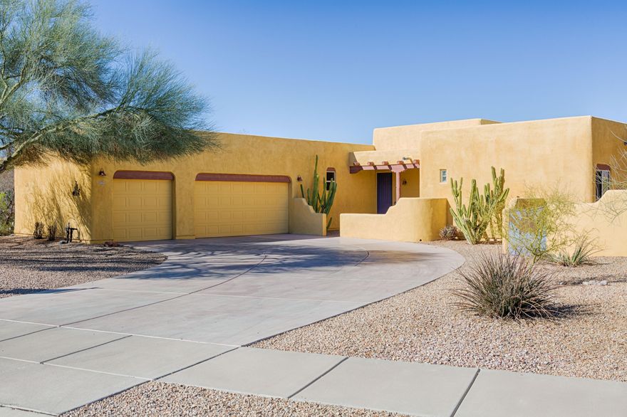 Motivated seller! Considering offers in the $325,000-$350,000 range! Do you need a wood shop or room to work on cars? Classic Santa Fe style home in prestigious Oro Valley! Location Location Location! Situated in the heart of town, this home features 4 bedrooms and 2735 sq. ft. of living space. Need a workshop? No worries!  A 400 sq. ft. heated and cooled shop is right off of the 3 car garage. ItÃ¢â‚¬â„¢s even wired for 220v and has plumbed-in compressed air! ItÃ¢â‚¬â„¢s perfect for the auto enthusiast, craftsman, or hobbyist.  With plenty of driveway parking, and outdoor BBQ/Kitchen/Covered Patio for those special gatherings, this home is also built to entertain. Enjoy sunset views while you listen to the water feature and sip a glass of your favorite wine with friends This lovely home is on a cul-de-sac street for quiet and privacy, and is on a .32 acre lot with quick access to everything Oro Valley has to offer. Perfect for the growing family, with plenty of room and access to some of the best schools in Arizona. This home won't last long, so call for your private showing today!