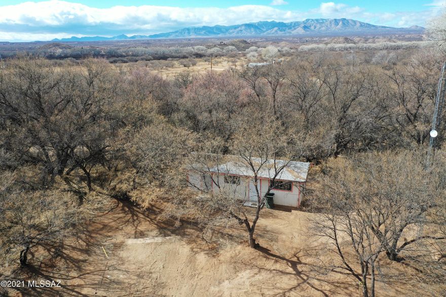 3 wooded parcels totaling  2.94 Acres! Great location to build. Electric on site and St. David Water.  Condition of septic unknown. Sold As Is, no repairs will be made. Parcels 121-21-010Q, 121-21-010H, and 121-21-014B Included in sale.