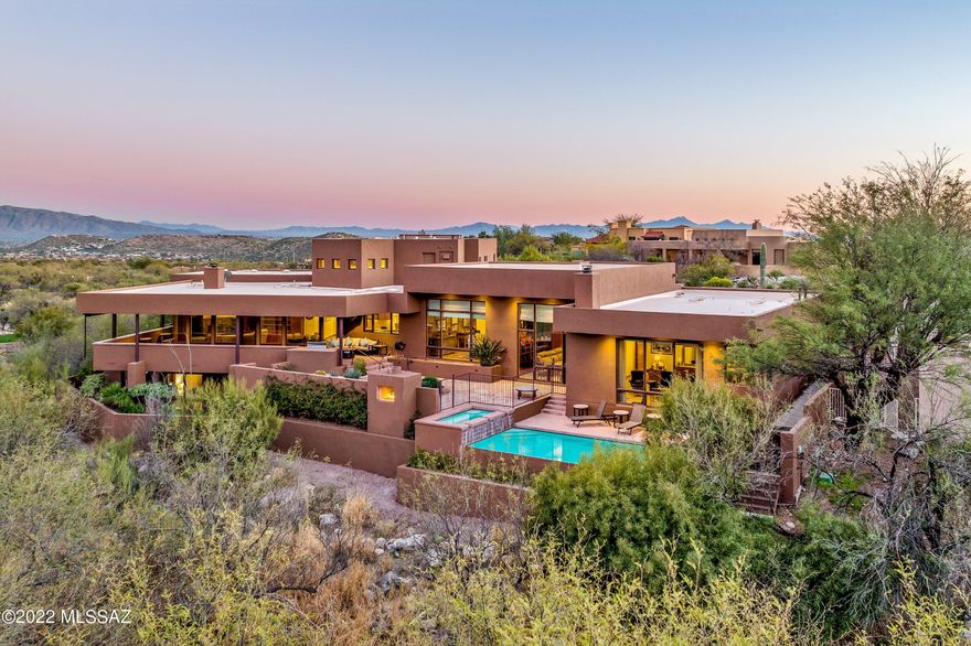 Spectacular Custom Contemporary in prestigious gated Ventana Canyon. Offering sweeping golf course, Mountain and Canyon views. Newly renovated one of a kind with highest quality throughout.  Chef's kitchen with cherry cabinets, high-end appliances, warming drawer, two dishwashers. Large walk-in pantry with dual wine coolers. Large media room. Indoor basketball court. There are limitless uses for the gym including a fitness room, dance studio or artist studio.   Exceptionally large Exquisite primary suite with fireplace, his and her baths with walk-in closets. All other bedrooms are substantial in size.  His/her office with built-in desks, grand bookshelves and alcove with daybed.  Beyond the glass soak in the captivating mountain and golf course views from your sprawling patio and pool. This home is made for entertaining and everyday living. Truly a masterpiece!