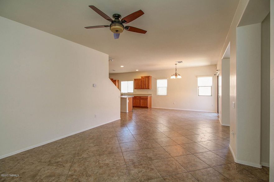 Charming 2 story home in Vail school district with 3 bedrooms and 2.5 bathrooms. Gorgeous kitchen with granite countertops, a island and lots of cabinets. 2 separate garages. Community facilities include volleyball court, community pool and walking trails. Please call today for a showing!