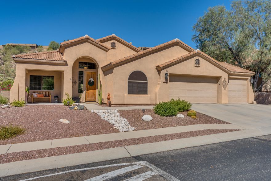 Gorgeous remodeled home situated in the sought after gated community of Sabino Mountain.  The home is east/west facing and provides beautiful morning and evening views of the desert landscape.  Home was remodeled in 2017 including new 20''x20'' tile floors throughout, new granite countertops in the kitchen, guest bath and interior painting.  Master bathroom includes new upper and lower cabinets and quartz countertops. New light fixtures throughout.  2019 new hot water heater, 2020 new AC!  Sun screens on the front and side of the home along with Tucson Rolling Shutters on the guest bedroom. Backyard features artificial grass, brick pavers and low maintenance side yard.