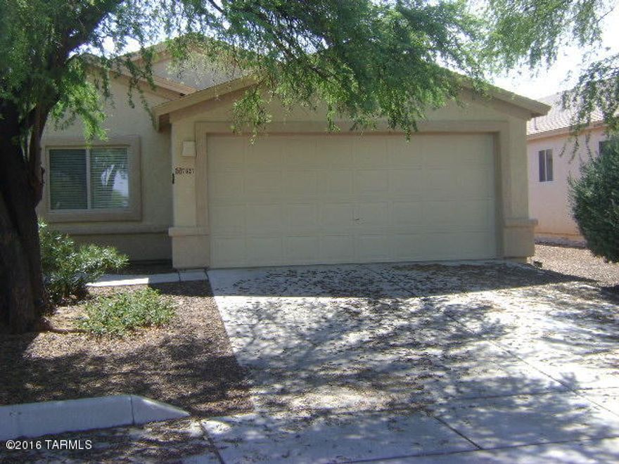 Move in ready. Freshly painted inside and out, brand new carpet in all bedrooms, all appliances included. No need to look any further. This low maintenance, 3 br, 2 full baths is perfect for the growing family or retirees. Nice kitchen with breakfast area w/lots of natural light,lots of cabinets and counter space, new SS double sink. Very spacious great room w/fireplace patio doors to private covered patio and back yard. Lg mstr BR with walk-in closet and full bath w/garden tub. BRs 2 and 3 also good sized and both have dbl closets. Separate laundry room with included washer/dryer. Located in quiet cul-de-sac and easy access to shopping centers, park w/pool, more. In Vail school district, w/ schools very nearby.