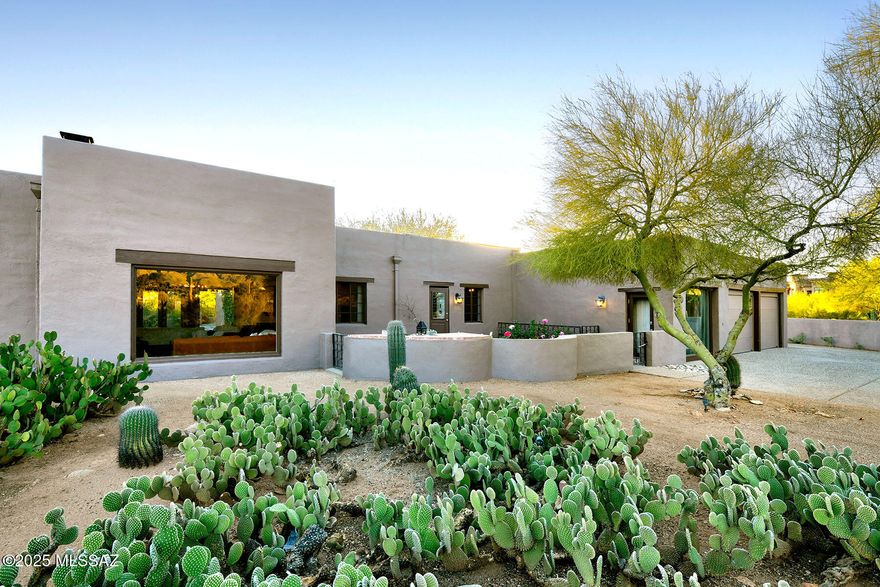 BUYER DIDN'T QUALIFY/FAILED TO FULFILL CONTINGENCIES-THEIR LOSS=YOUR GAIN!! Stunning 1938 adobe home by renowned architect Josiah Joesler; 1.28 acres w/ breathtaking mountain views & incredible charm. Tucked behind custom wooden gates, private entry courtyard w/ bubbling fountain & fireplace leads to beautifully restored adobe home w/plaster walls, original hardware, & hand-painted tiles by artist Ysauro Uriarte. Primary suite addition features lovely sitting area, romantic fireplace, large dual-sink bath, & generous walk-in closet. Split bedroom plan also includes bonus room/studio/home office. Serene outdoor space w/gorgeous pool, exterior hot sauna, cold plunge, & greenhouse, basement & direct access to miles of walking trails. Wonderfully private in an unbeatable foothills location