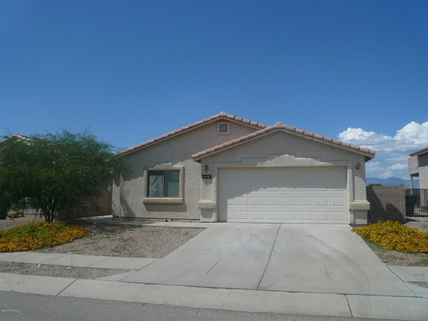 Great mountain views from large walled backyard. this 1663 sqft. home has 4 bedrooms, 2 full baths, 2 car garage, lots of ceiling fans, central a/c. great South east  location, close to shopping and I-10 access.