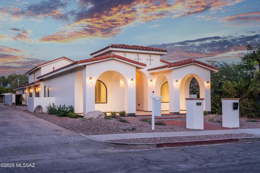 Beautiful brand new build in the historical Sam Hughes neighborhood. Spacious 4 bedroom, 4 1/2 bath home, featuring gorgeous master ensuite with spa like shower and bath, large walk in closet with washer/dryer hookup, and private porch to watch sunrise over the catalinas. The 4 car garage has car charging capability and plenty of room for toys and storage. No expense was spared on the finishings, marble countertops in bathrooms, Taj Mahal quartzite countertops in kitchen, upgraded appliances, custom fireplace finish, antique doors invite you into the front office, bamboo flooring throughout. The entire house is wired for surround sound. Walking distance to U of A, restaurants and just minutes drive or bike ride to downtown. You must see this thoughtfully designed gem for yourself!