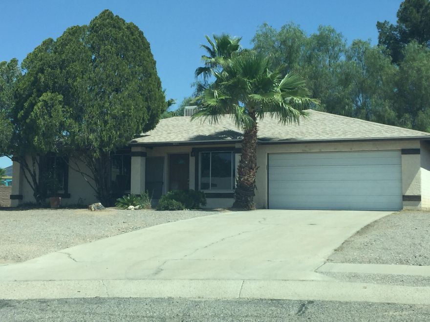 8041 N Soledad Ave Tucson, AZ 85741.  3 bedroom 2 bath single family home. Completely remodeled from top to bottom.  Brand new flooring, kitchen, and bathrooms. No carpet in the house. 2 car garage. HUGE  backyard.   Evaporative cooling