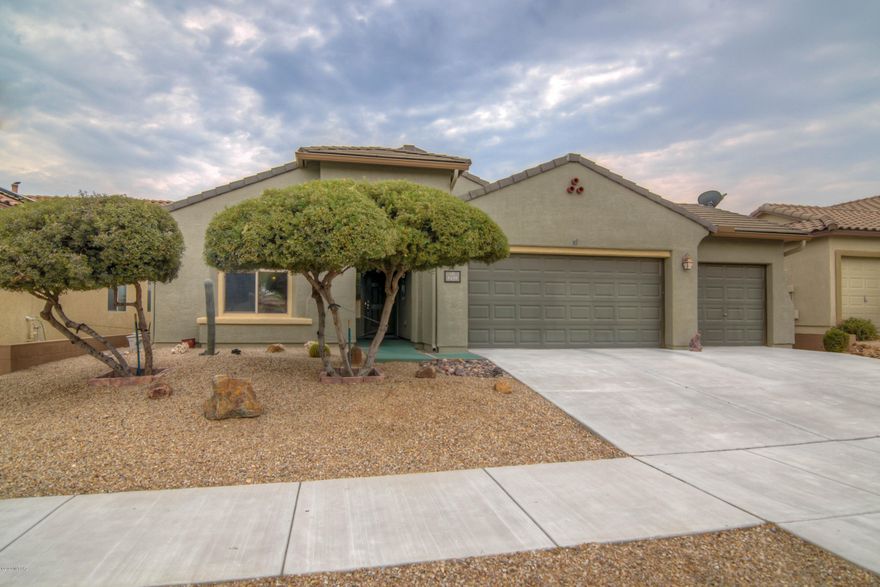Come experience this beautiful and meticulously cared-for 2,104 sq.ft., 4bed/2bath home in the highly desirable Sierra Morado neighborhood!  Featuring Solar Hot Water (owned/installed by builder), 2017 HVAC system, ceramic tile throughout (no carpet!), ceiling fans, granite c/tops in Kitchen and a premium lot, this home has so much to offer!  Relax and enjoy the expansive MOUNTAIN VIEWS from your east-facing patio that extends into gorgeous flagstone and forever-green turf!  Located in the Vail school district and close to parks, trails and medical, you won't want to miss this opportunity!  Be sure to ''walk'' through with our 3D Tour under the Photos Tab!