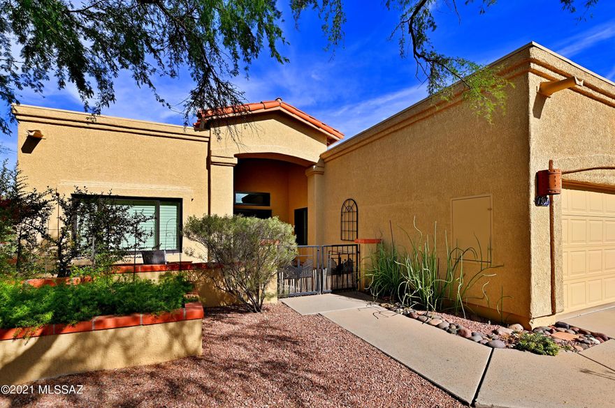 Amazing El Conquistador townhome with privacy + mt views and more. This is a highly sought 3/2 (1516sf) SW style with a 2 car garage and oversized patio. Inside SW style through-out with satillo tile, tile countertops at kitchen/ baths, plus more. Great room plan with an impressive fireplace plus split bedrooms offer privacy and functionality. Outside the home sits on a ridge top with Oro Valley, Tortolita & Catalina Mtn views. An oversized patio with extensive brickwork makes for comfortable outdoor living/ entertaining. Located in one of the most naturally beautiful parts of Arizona with easy access within Oro Valley makes this a highly demanded home. Some furnishings convey, ask for details! Priced to sell schedule your showing today.