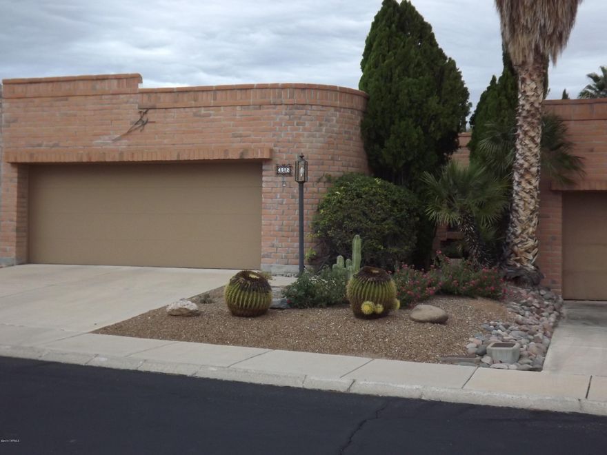In a green oasis in the desert, this 2db, 2ba home is warm and welcoming and in a peaceful enclave of homes in Fairfield,  The lovely ceramic tile flooring in the living area, kitchen, and baths give the home warmth & easy care living. The architectural detail on the FP adds a real designer touch to the home. The eat-in kitchen also has an island with breakfast bar and easy access to the garage. A very large master bedroom and good sized guest room make this a very livable home in a great neighborhood near shopping, dining, and Sabino Canyon. Plenty of storage here with lots of closet space. The private back yard has a peek of the mountains. Sellers are motivated, come take a look.