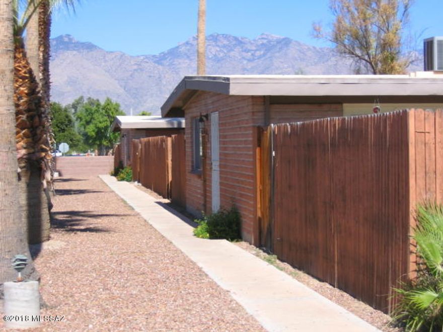 Great one story burnt adobe 4-plex across street from Ft. Lowell Park, walking distance to Tucson Medical Center. Near the River walk, Whole Foods, restaurants and Costco. Very well maintained two 3
bedrooms, 2 baths with large yard and two 2 bedrooms, 1 bath with front courtyard entry building.
Each unit with refrigerator, dishwasher, washer/dryer, eat-in kitchen. All units have front wrought iron screen doors. Newly recoated roof. Tenant pays for gas and electricity. One of the owners is licensed to sell
real estate in the State of Arizona.
