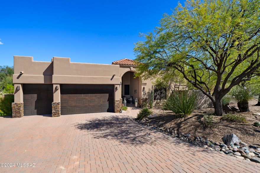 Enjoy Catalina Mountain views from this privately situated residence located in the highly sought-after Desert Vista community. This spacious, bright, and airy split bedroom floor plan features 3105 sq ft, four bedrooms, and three baths. Enjoy interior spaces that range from open and soaring to cozy and intimate. The layout takes full advantage of natural light, blurring the boundaries between the interior and exterior spaces. Before entry, you are greeted by the large outdoor foyer area, which establishes the main connection point of the home. Once inside, the pristine tiled floors float seamlessly throughout the space, subtly contrasting the custom-painted walls and textures.