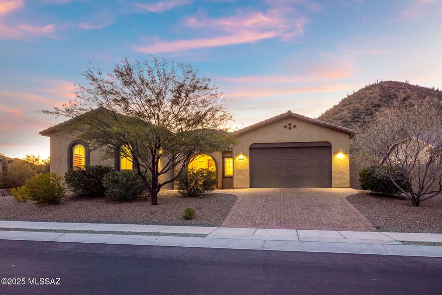 Nestled against a stunning backdrop of saguaro-studded desert scenery, this exquisite 4-bedroom, 3-bathroom home offers unparalleled tranquility and breathtaking sunsets painted in deep oranges and purples.

Step inside to discover soaring ceilings and a thoughtfully designed open floor plan. The gourmet kitchen features ample cabinetry and is perfect for entertaining. Beautiful tile flooring flows throughout the home, complementing the custom-tiled showers and modern finishes.

A bonus or flex room provides versatility to suit your lifestyle. As an Energy Star-certified home with owned solar panels, this property combines comfort and efficiency.

Outside, enjoy the ultimate oasis with a sparkling pool and spa surrounded by elegant pavers, perfect for relaxing or entertaining.
