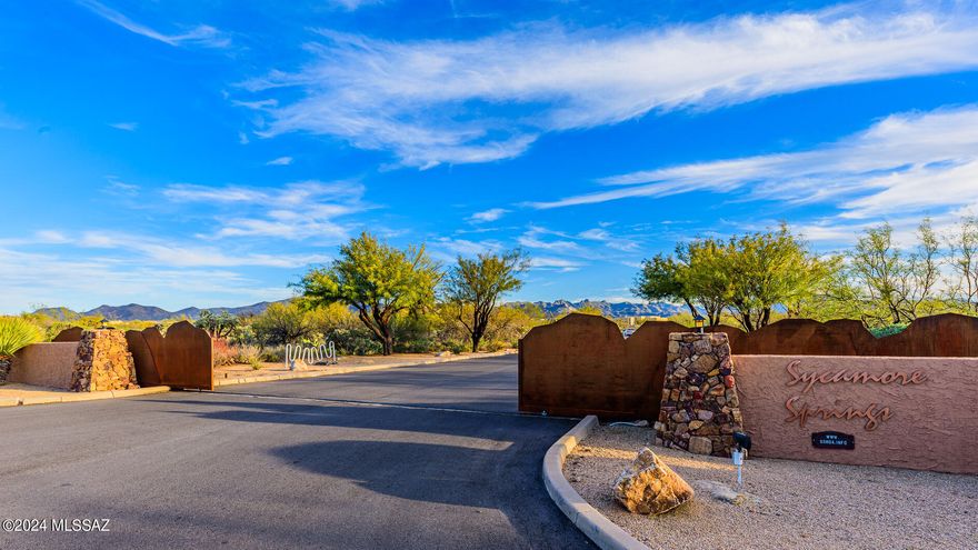 Fresh paint, fresh carpet! THIS HOME HAS IT ALL! Price ranging between $795000 to $810,000. Gorgeous semi-custom home in the gated Sycamore Springs Community!  Vail School District! Sitting on a little over 2 acres, this beautiful 2760 SF home features 3 Bedroom, a den and 3 baths! A Chef's Dream w an updated gourmet kitchen features white cabinets, granite countertops, an extended oversized island that serves as a breakfast bar/dining table, custom backsplash and top of the line stainless appliances. 2 fireplace inserts provide the perfect ambiance for those family get-togethers!  In-wall surround sound with Alexa built in! Advanced Smart home!  Split floor plan for extra privacy!  Custom counter/cabinets at entrance for extra storage needs! Bring your toys!  More than enough parking for your boat, RV, car collection etc!  Home features a 3 car garage plus a 20 x 50 RV garage with 200 amp outlet!  And if that's not enough....there are 2 separate double gates into the back yard for more parking room!  But wait, there's more!  Step outside into your tranquil backyard oasis featuring an amazing pool, spa, extended patio and the most pristine mountain and sunset views that you have ever seen!  Schedule your showing today!