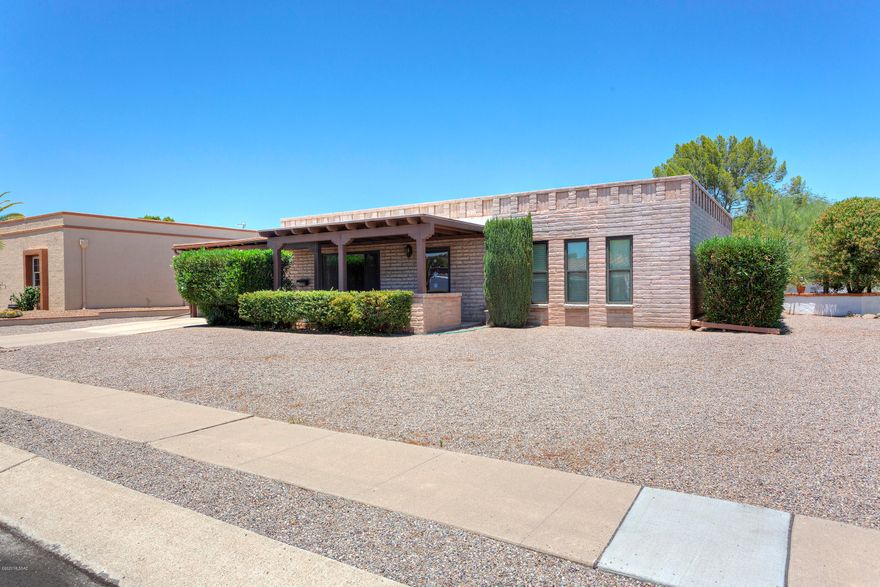 This house is clean, clean, clean and ready to go! Located in the remarkable Green Valley Fairways, this charming home is only minutes from Haven Golf Course and Country Club of GV, East GVR center, restaurants, and shopping! This meticulously well-cared-for home is awaiting all of your personal touches. Enjoy sitting under the private, covered front patio with fantastic views of the Santa Rita Mountains. You'll certainly appreciate the updated HVAC system, dual pane windows, newer water heater, and recent interior and exterior paint. Separate laundry room with extra storage.    AZ room provides easy access to the large low maintenance backyard - perfect for entertaining.  Spacious lot with a rear alley behind the property provide plenty of privacy. Truly a great home at a great price!