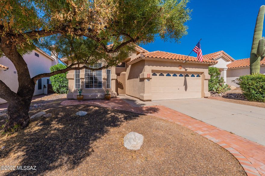Sales price ranged between $345,000 and $355,000. Seller is a licensed Realtor in state of AZ.  Enjoy your peaceful lushly landscaped backyard with putting green while listening to the fountain, or cozy up next to the outdoor fireplace and enjoy majestic mountain views.  This split bedroom floor plan has had many upgrades including granite counters, sinks, faucets, window treatments, custom backsplashes, carpet in bedrooms replaced 3 years ago, recently painted throughout, wi-fi controlled  garage door, and more. All appliances are included!  Conveniently located near shopping, movie theater and restaurants.