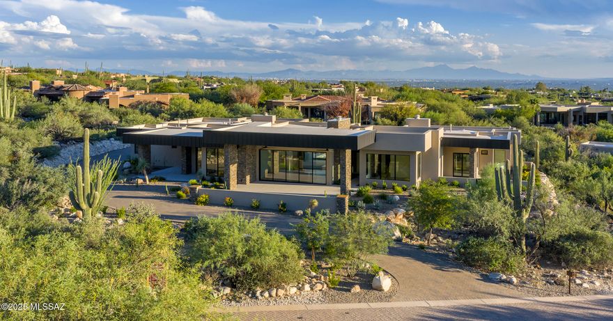 New Construction Modern Contemporary Custom Built home within the secondary gates of Pima Canyon's most coveted enclave of Pima Gardens. This Modern Contemporary masterpiece, designed  by Kevin B. Howard
Architect. Built by master builder  John Matalone of Riviera Homes, LLC.  Built with only the quality materials and attention to 
details that you would expect in every aspect of this magnificent custom home.  John Matalone's  44 years of home building 
experience are evident in all the details such as interior 5/8''drywall throughout home, high density insulation, custom made interior 1 3/4'' solid core rift cut oak doors and  Engineered Brazilian wood porch ceilings. Exterior Dryvit Stucco and many other custom features. Owner/Agent
