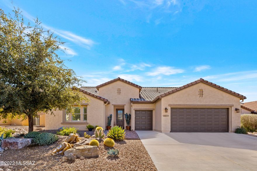 Upgraded 2011 Pima with Golf Course & Mountain Views. This 2 Bedroom + Den / 2.5 Bathroom / 2,458 SF / Extended 2.5 Car Garage Home is a rare find! Tile floors thru main areas of the home. Great Room has custom built-in entertainment cabinet & desk system. Dining area with slider to patio. Kitchen has Quartz countertops, Hickory Cabinets, Gas Range, Stainless Steel Appliances & Walk-in Pantry. Owner's Suite with door to patio. Owner's Bathroom with walk-in shower, garden tub & walk-in closet. Powder Room. Den with French Doors. Guest Bedroom with En-suite Bathroom. Laundry Room with storage. Extended 2.5 Car Garage with Utility Sink, Water Softener, cabinets & side entry door. Lovely Landscaping & Gated Yard. Covered Patio with extended paver patio to relax & enjoy mountain views everyday!