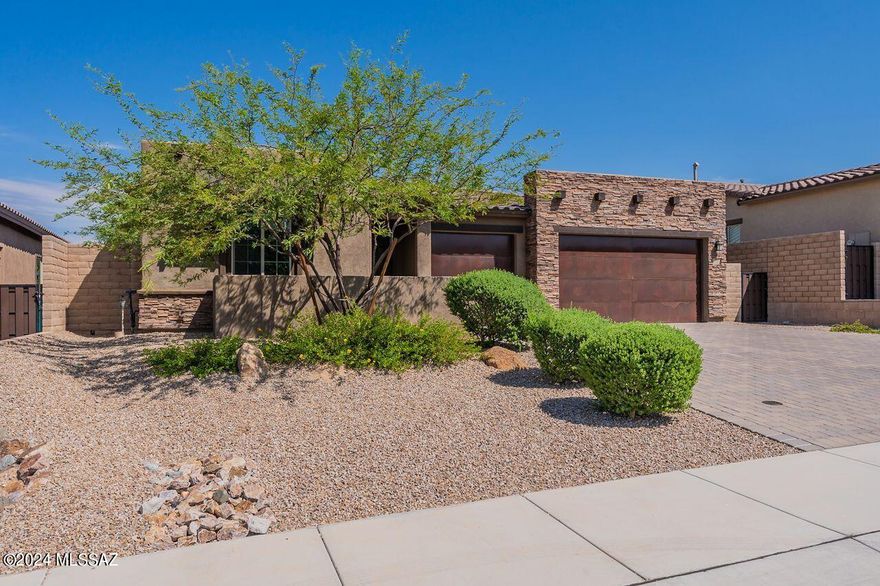 SELLER MOTIVATED and READY FOR QUICK MOVE-IN! Desirable Darius plan in Boulder Pass at Dove Mountain! Located near the end of the cul de sac, this home has access to nearby amenities such as: golf, hiking trails, Ritz Carlton. Off the foyer, BRs 2 & 3 share a Jack & Jill bath & are set away from the bustle of great room/kitchen. Nearby, a guest suite, complete w/separate sitting room & BDRM, w/ its own en suite. Formal dining or den. Open great room & kitchen, w/ wall of glass doors to enjoy the tranquil view & pool! Kitchen offers huge island w/ seating, 6 burner gas cooktop, blt in oven & micro, dining. Relax in owners suite, w/ large shower w/bench, soaking tub, roomy closet. Step outside to a private rear yard w/desert & mountain views, sparkling pool, open & covered patio areas