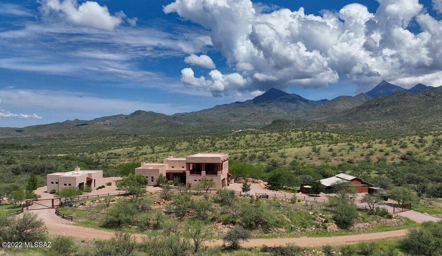 MAJOR PRICE REDUCTION!! A SPECTACULAR SOUTHWEST CUSTOM MASTERPIECE ON 39 ACRES AT THE PRESTIGIOUS & HISTORIC SALERO RANCH IN SANTA CRUZ COUNTY. The Triple JB Ranch has a stunning main house with 3,179 sq ft & a fabulous 1,030 sq ft guest house, exercise room, pool, six stall barn plus a loafing shed & drought tolerant landscaping. The home boasts 10-16 ft ceilings, a gorgeous wall of windows from the open great room & incredible views from every room. It is the perfect inside-outside flow to the mountain views that ranch living is all about. The hand plastered walls & gourmet chef's kitchen add to the luxurious feel. This meticulously built & maintained property is better than new. Excellent private well. Come see this remarkable property & experience quiet, relaxing lifestyle at Salero. Located in southeast Arizona at a mild 4,500 feet elevation, the ranch has arguably the finest annual climate in the state. This magnificent home is perfect for entertaining with plenty of gathering space inside and out. The Starlink high speed internet is fantastic and your family and friends will never want to leave the marvelous guest house. The ranch has endless hiking, mountain biking, birding and horseback riding trails. The phenomenal views, open space, peace and solitude that surrounds this home cannot be duplicated in any city setting. No expense was spared. The Triple JB Ranch is offered far below replacement cost and is ready for you to enjoy today! DO NOT MISS THE INTERACTIVE MAP AND WALKTHROUGH VIDEOS IN THE PHOTOS TAB. MOST FURNITURE IS NOW INCLUDED IN THE SALE WITH A STRONG OFFER!