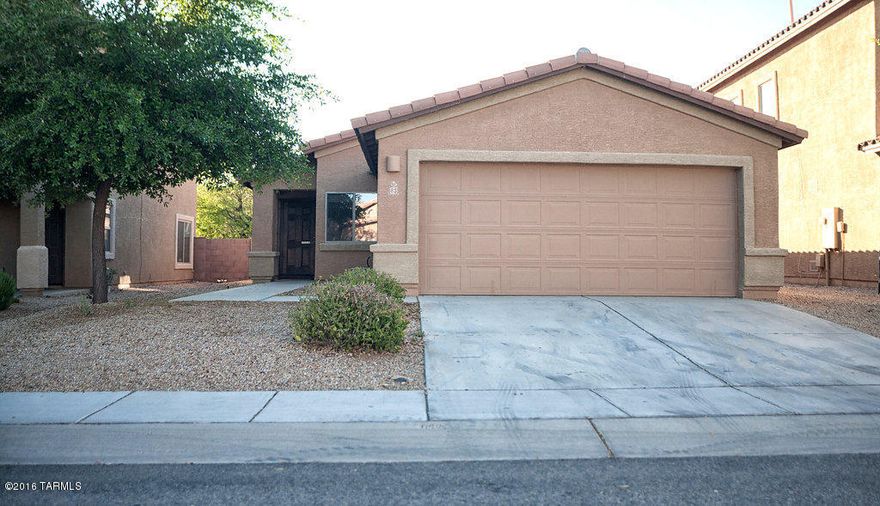 Remarkably well taken care of home. Lots and lots of upgrades on the inside, including lighting, ceiling fans, cabinets, very tasteful paint, windows, new carpet, Mexican ceramic tile, and wood blinds throughout. Home is much nicer than many in the same neighborhood, and offers beauty, serenity, and relaxation! Nothing needs to be done to this home.  All appliances convey, including very nice shelving in garage. Garage floor has just been re-done and is beautiful! Seller is offering a home warranty to the buyer and warranty is still valid from the original builder.
