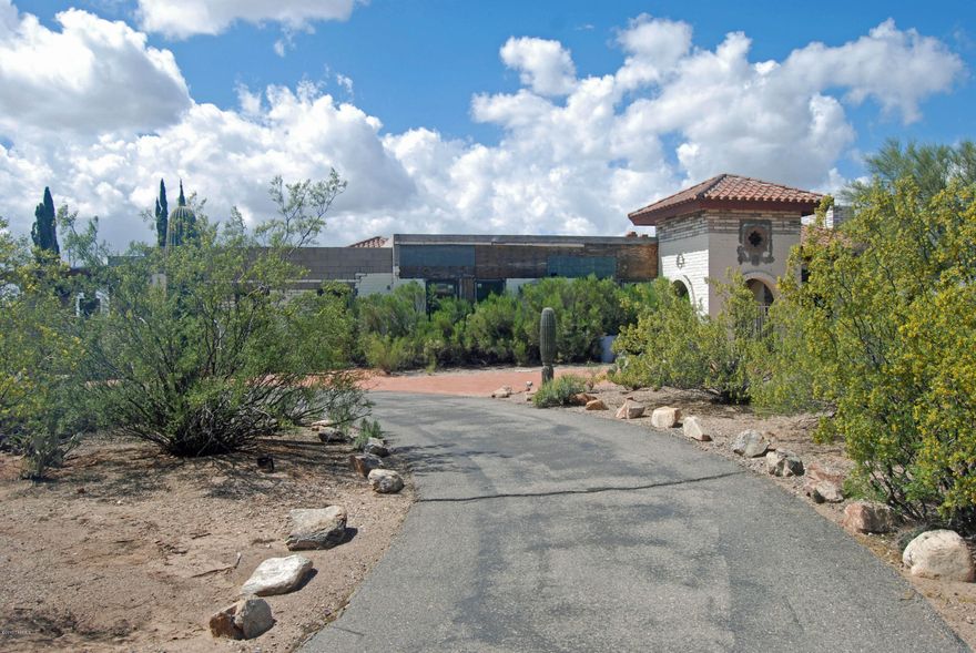 Amazing possibilities & hidden value! This 6.25 acre parcel zoned CR1 was approved for a six lot split in November 2008 with one of the lots retaining the existing 5 bedroom 3700+ sq. ft.  Residence w/Pool. The residence was gutted, Mother-in-Law Suite was added increasing Sq. Ft to approximately 4650 and the roof was raised, so that it would conform to the planned new construction on additional lots. Then came the real estate crash… the plans stopped and with some passage of time, created this Diamond in the rough!  Beautiful property at the base of the Santa Catalina mountains, within a mile of Sabino Springs & Arizona National Golf! Plans were all approved to the existing point of construction, mechanical, electric, plumbing etc.