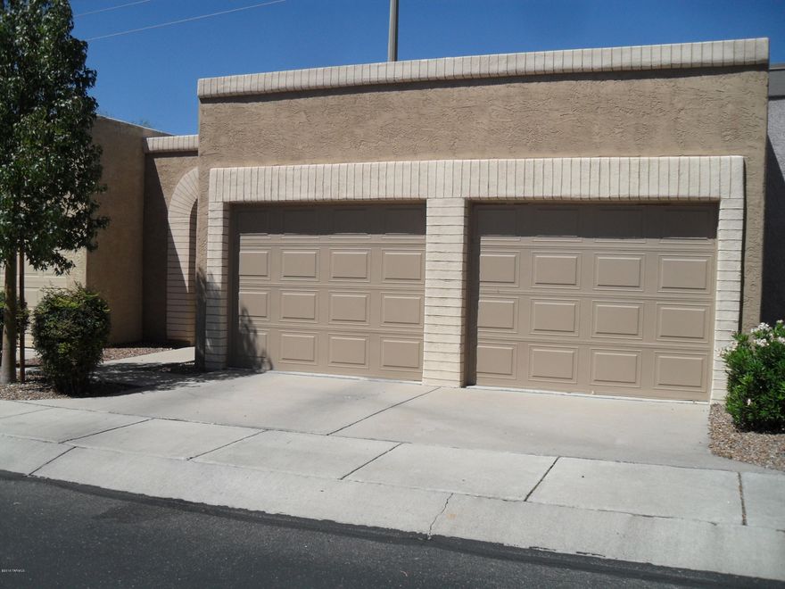 Very pleasant community. Great East location with amazing views of the Catalina Mountains outside of your windows and backyard. Very wide buffer from the road. Home sports dual pane low E windows throughout.  Vaulted ceilings, fireplace, Lots of light. Great kitchen with high-end refrigerator that stays. HOA keeps the landscape nicely manicured,and is responsible for the private road maintenance.Take a look at what pride throughout is.  NO POLY in this home. Screening above the garage door mechanism is to prevent birds from nesting. Considered both a carport and a garage.
