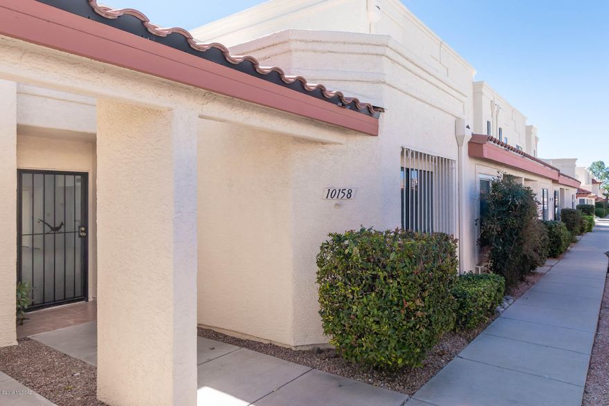 This turnkey, bright and airy 2 bed, 2 bath townhouse is move-in ready! NO POLY PIPES! Brand new AC installed 2019. Offering tall ceilings, lots of natural light and split floor plan, this spacious home has been beautifully updated! The open kitchen boasts brand new granite counters and an abundance of storage. The master suite includes private access to the backyard and the recently-renovated bathroom includes executive-height granite counters and large walk-in tile shower. Entertaining space includes a private outdoor atrium between great room and master bedroom and patio/backyard off master. Neighborhood is set in a desirable East-side location close to shopping, dining, and a short drive to Saguaro East!