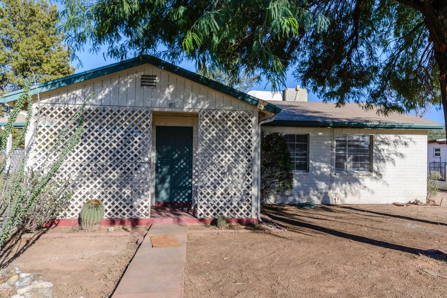 Range pricing Seller will accept and/or counter offers between $154,900 & $159,900. Welcome to the Colonia Allegre community. This single story home is located on .24 acres with a completely fenced in backyard. 1,342 square feet with 3 bedrooms, Great Room & a updated Kitchen  with Maple Cabinets, gas range, microwave, dishwasher & Refrigerator. NO Carpet! Tile & Laminate flooring throughout. Large Covered Back patio extra deep. Mature trees in the front and back yard & the back yard is adjacent to alley, no one directly behind this property. Air Conditioning and Evaporative Cooler for dual cooling. Across the street from the elementary school very convenient to schools, shopping & restaurants. No HOA, room for your RV & or extra cars and outdoor toys. Move In Ready!