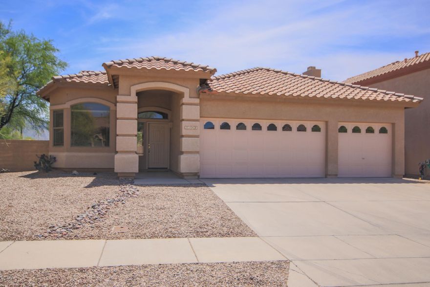 This is a gorgeous home that sits on a corner lot in the Rancho Del Norte subdivision. It has 3 bedrooms and 2 baths with a den which can be used as a home office, exercise room or a play room for the children! Home has all new carpet and central vacuum throughout along with a living room and separate family room so there is plenty of space for entertaining. Enjoy mountain views from the backyard which sits high on the corner lot so that you never miss one of Tucson's amazing sunsets also, 2 foot extension in garage!  Bring all offers. This is a must see!