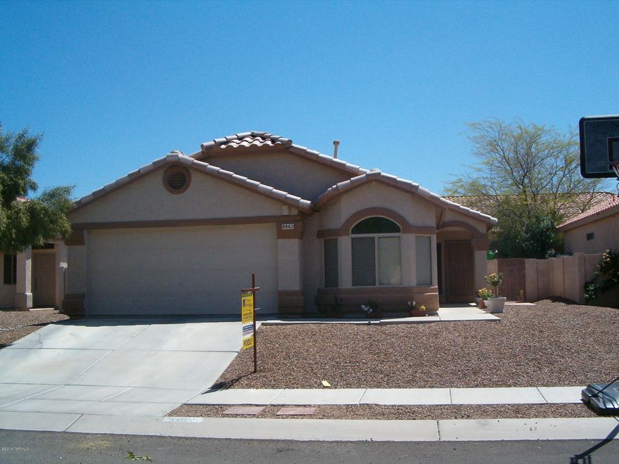 Lovely 4 bdrm. 2 bath, completely tiled, with a 2 car garage. Come enjoy the beautiful swimming pool and built-in BBQ for great family entertaining.