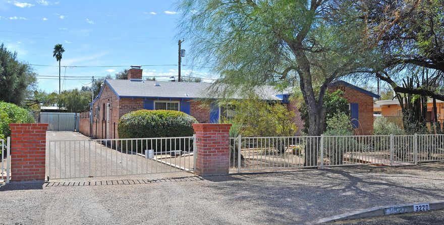 Updated classic bungalow on a stylish street in Blenman-Elm area. Double brick construction on a large fully improved lot with mature landscape and outdoor entertaining area. Open floor plan with living room & den, 3 bedrooms, 2 full bathrooms, large kitchen with butlers pantry, and extra storage. Home has been thoughtfully updated and is in excellent condition. Gated driveway and beautiful outdoor areas in front and back yards. Includes all appliances.
