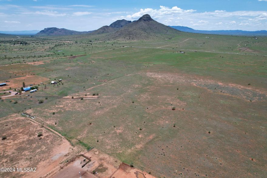 Don't miss the opportunity to own 20 acres of land in AZ wine country with stunning views of the iconic Biscuit Mountain, located in the serene Mustang mountains. This picturesque property is within sight of the renowned Los Milics Winery, ranked #2 best winery by USA Today.
Perfect for a homestead or ranch. Ideal location for a winery or tasting room. Potential for multiple tiny homes. Option to subdivide into smaller parcels.
Buyer will have option of right of first refusal on adjacent lots. 
Well share agreement available.
 Easement access via E Rain Valley Loop Rd.