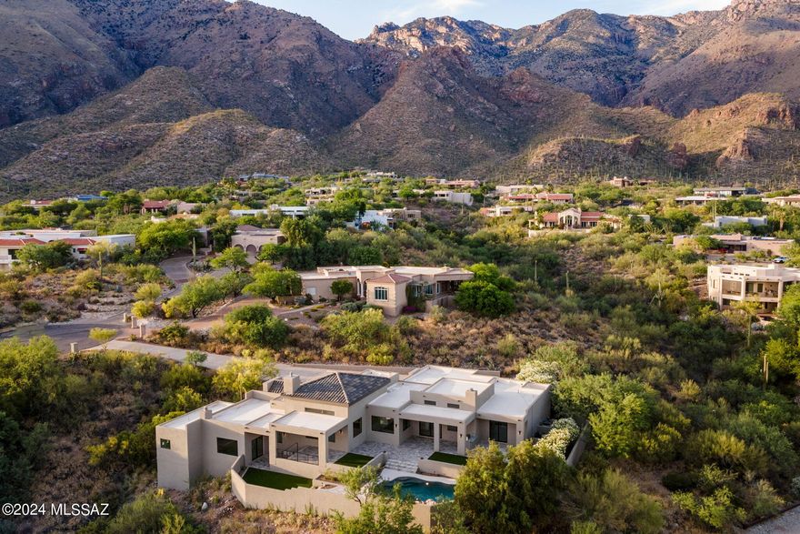 Immaculate Luxury Living Starts Here! Perched on one of Alta Vista's Best Elevated, Private Cul-De-Sac Lots, You'll Find Spectacular Views From Every Window. Enhancing the Architect's Perfectly Sighted Original Design, Owner's Have Remodeled & Transformed This Home into a Modern Gem of Fine Finishes & Grand Living Spaces. New DryVit Stucco Exterior, Tile Roof, Milgard Windows, Custom Garage Doors, Steel Pivot Entry Door & Complete Landscape Overhaul. Offers 3 Spacious Bedrooms + Large Office/Den. Elegant 24'' x 48'' Tile Throughout, Stunning Fireplaces & Trend Forward Kitchen w/ Spacious Taj Majal Quartzite Island, GE Monogram/Cafe Appliances & Gorgeous Cleaf Modern Cabinets. Exceptional Resort-Like Backyard w/ Travertine Patios, Built-In BBQ, Multiple Turf Areas & New Pebble-Tec at Pool.