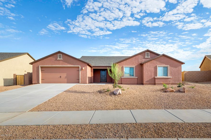 The Roosevelt includes a covered front porch, two-car garage and a spacious covered back patio, perfect for dining outdoors or watching the kids and pets play on cool Arizona evenings. In addition to a spacious living room and separate dining room off the kitchen, the Roosevelt includes a den space that can be flexible to suit your family's specific needs. The private master suite is a large bedroom with a giant walk-in closet. All of the additional bedrooms are conveniently located by a spacious laundry room and two of these three bedrooms also include walk-in closets for extra storage space. The Roosevelt is perfect for a growing family and provides all the space you need at an affordable price.