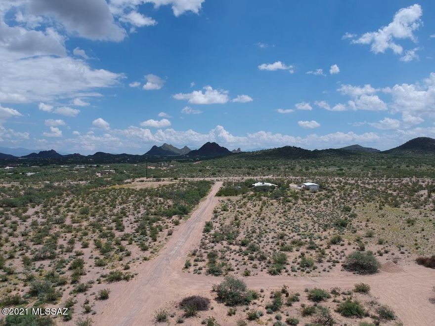 SELLER WILL ACCEPT OR COUNTER OFFERS BETWEEN $55,000 - $65,000. GORGEOUS ONE ACRE LOT SURROUNDED BY BEAUTIFUL VIEWS. LOT IS PERFECT FOR THOSE LOOKING FOR PEACE AND QUIET BUT ENJOY DRIVING INTO TOWN IN LESS THAN 20 MINUTES. 15 MINUTE DRIVE TO SHOPPING, ENTERTAINMENT AND I-19. ABOUT 1 MILE NORTH OF CASINO DEL SOL. LOT IS LOCATED IN A DESERT ''ISLAND'' SURROUNDED BY PASCUA YAQUI LAND AND FEDERAL LAND.  ELECTRIC IS LESS THAN 100 FT AWAY. BEAUTIFUL SUNSETS, MUST COME AND TAKE A LOOK. 2 ADDITIONAL ACRE LOTS NEXT TO THIS ONE ALSO FOR SALE (MLS # 22123890 AND 22130722). SELLER IS A LICENSED REAL ESTATE AGENT IN THE STATE OF ARIZONA.