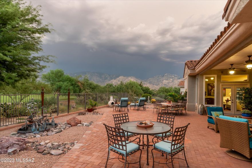 Amazing golf course home with unbelievable views of the Catalina Mountains. This spectacular updated 3 bedroom, 3 bath home is not to be missed. As soon as you enter the home you feel the warmth and inviting feeling you get as you gaze upon the many updates this Carrington floorplan has to offer. The gourmet kitchen is a cook's delight with its custom cabinetry with crown molding, SS appliances, induction cook top, custom center island with gorgeous leather granite will not disappoint if one loves to cook and entertain. The family room is off the kitchen with gas fireplace, custom mantel and fabulous views. Romantic oversized primary suite with Bay window let's one gaze at the views as you awake in the morning.  Primary bath is fabulous with executive height vanities, updated lighting, Walkin closet with and unbelievable shower! Secondary bedroom can be used as another primary and ensuite updated bath. The 3rd bedroom is off kitchen with adjoining bath. The 2.5 attached garage has plenty of storage and room for toys. The back patio area is an entertainer's dream, with plenty of seating areas, covered patio, brick pavers and again you will be mesmerized with the wonderful views. Don't miss this gorgeous home and enjoy everything the home offers.