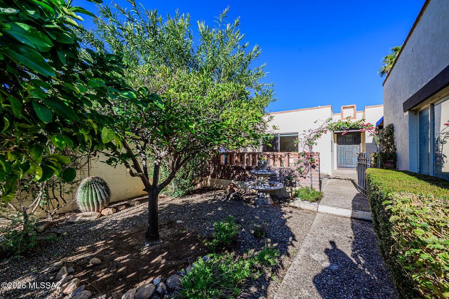Beautifully updated 1,838 square feet, 3BR, 2BA, 2-car garage townhome in desirable Catalina Pueblo - with very close proximity to La Encantada and other shops, restaurants, and galleries at Skyline/Campbell. Just steps to one of three community pools. Upgraded kitchen and baths, floors, and interior finishes. Oversized two-car garage with ample off-street parking. Walking paths, three community pools, and a spa. LOW HOA FEES. Large courtyard entry with multiple citrus trees, & two fountains! In the backyard, you have a low-maintenance covered rear patio with a potential viewing deck and travertine paver rear yard with access to a common area for extra privacy.