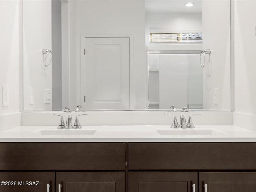 Brand new, energy-efficient home available by Jun 2026! The Onyx floorplan in Tucson, Arizona offers single story living with 3 bedrooms, 2 bathrooms, and a 2 car garage. Enjoy an open style living area that makes hosting a breeze. The secluded primary suite offers an escape at the end of the day. Summerstone is now selling in Marana, Arizona. Conveniently located near the Continental Ranch area, this community offers access to both Marana and Northwest Tucson via the I-10. Residents can enjoy the outdoors at Saguaro National Park, El Rio Preserve, and the Summerstone community park. Move-in ready with a washer, dryer, fridge, and whole-home blinds; closing in 60 days or less - guaranteed. We'll reimburse up to $5,000 for delays we cause.  Each of our homes is built with innovative, ener