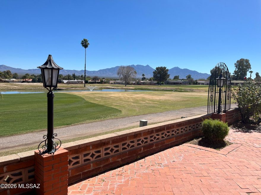 Stunning golf course and Santa Rita Mountain views.  Spacious 2,449 square foot home with 2-bedrooms and 2 baths.  Formal dining space, eat-in kitchen.
