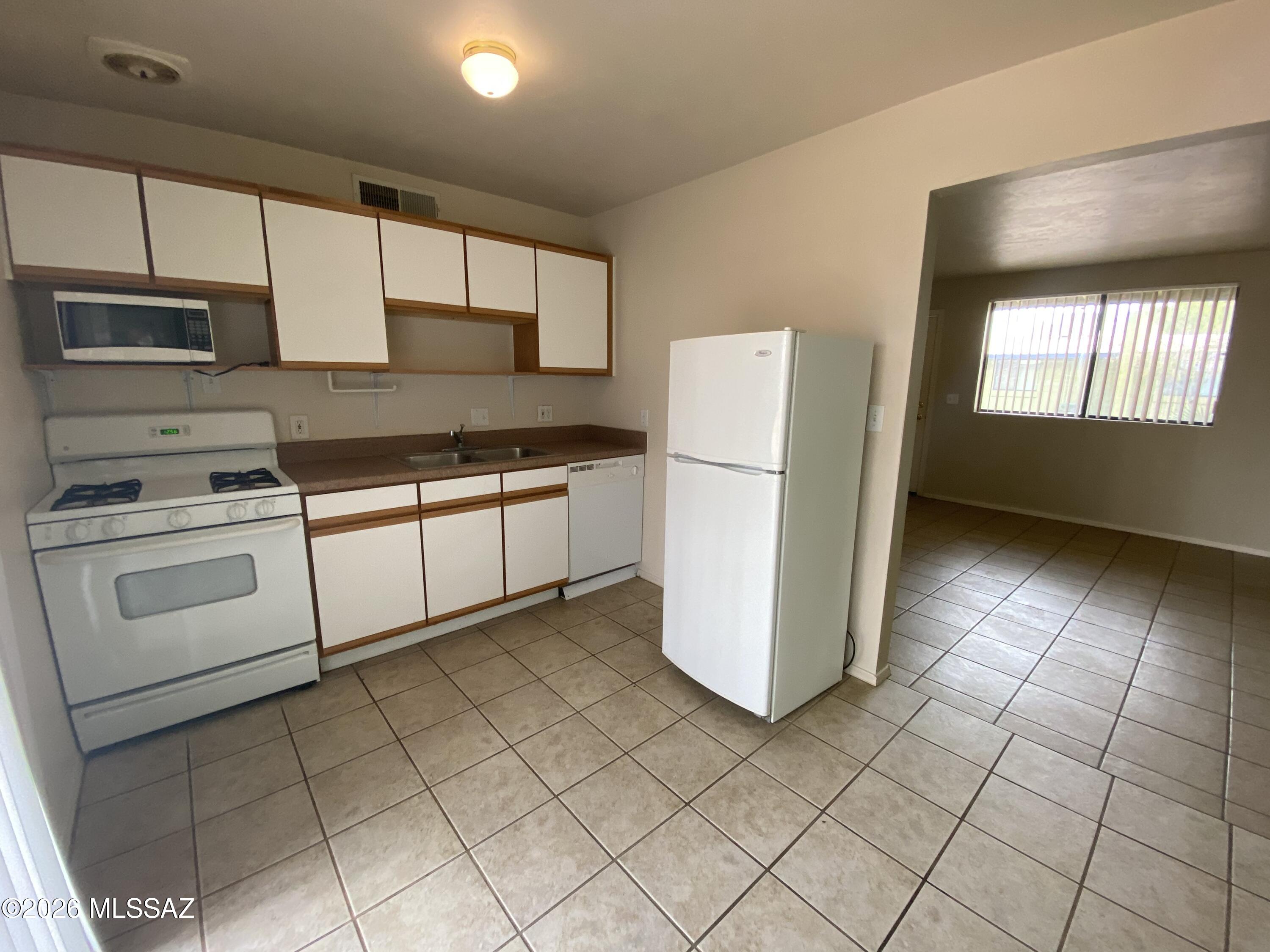 Sunset Foothills Condos (1-201) - Residential Lease