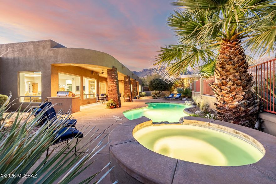 * MODERN ELEGANCE* INCREDIBLE ESTATE LOCATED AT THE BASE OF THE CATALINA MTNS...SURROUNDED BY SOARING SAGUAROS, MAJESTIC MTN RANGES & LUSH DESERT VEGATATION! FEEL THE BEAUTY OF THE DESERT- WHILE MINUTES FROM TONS OF SHOPPING/RESTAURANTS/UOA /MEDICAL- ALL AT YOUR FINGER TIPS- PERFECT LOCATION! PRESTIGOUS GUARD '' GATED'' PIMA CANYON IS FILLED W/ HMS FROM $2-5 MILLION NESTLED IN CATALINA FOOTHILLS! INCREDIBLE VALUE FOR AREA- CUSTOM ''MODERN'' DESIGN TOUCHED W/SW FLAVOR TO BRING DESERT MAGIC INDOORS! FILLED W/ FINE APPOINTMENTS- HUB OF THE HM- GOURMET KIT- UPSCALE SS APPLIC, SLAB GRANITE, STONE FLRS, GREAT RM, FP'S, ALL ''EN-SUITE'' BR'S, *BONUS RM*- MEDIA/DINING/FLEX RM, SPARKLING POOL/SPA- FULLY LANDSP,OVERSIZED 3 CAR GAR...MUCH MORE! HAVE INSTANT EQUITY** LOWEST PRICE IN PIMA CANYON