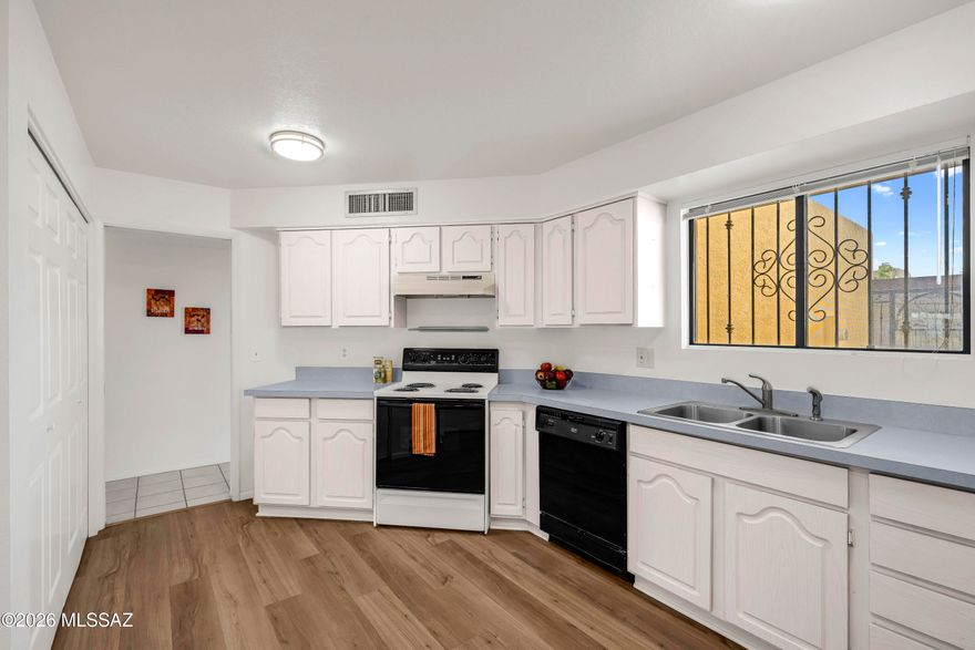 Nicely updated townhome has a large downstairs bedroom with on-suite bathroom, walk in closet & covered patio - ideal for enjoying the mountain view while drinking your morning coffee. Well thought out layout with welcoming entrance, kiva fireplace.  Generous kitchen with plenty of cabinets and counter space.  Separate guest powder room downstairs  Two large bedrooms and second full bathroom upstairs.  Two car garage with extra storage and car-length driveway.  HOA fees cover water, sewer, pool, spa and common area maintenance.